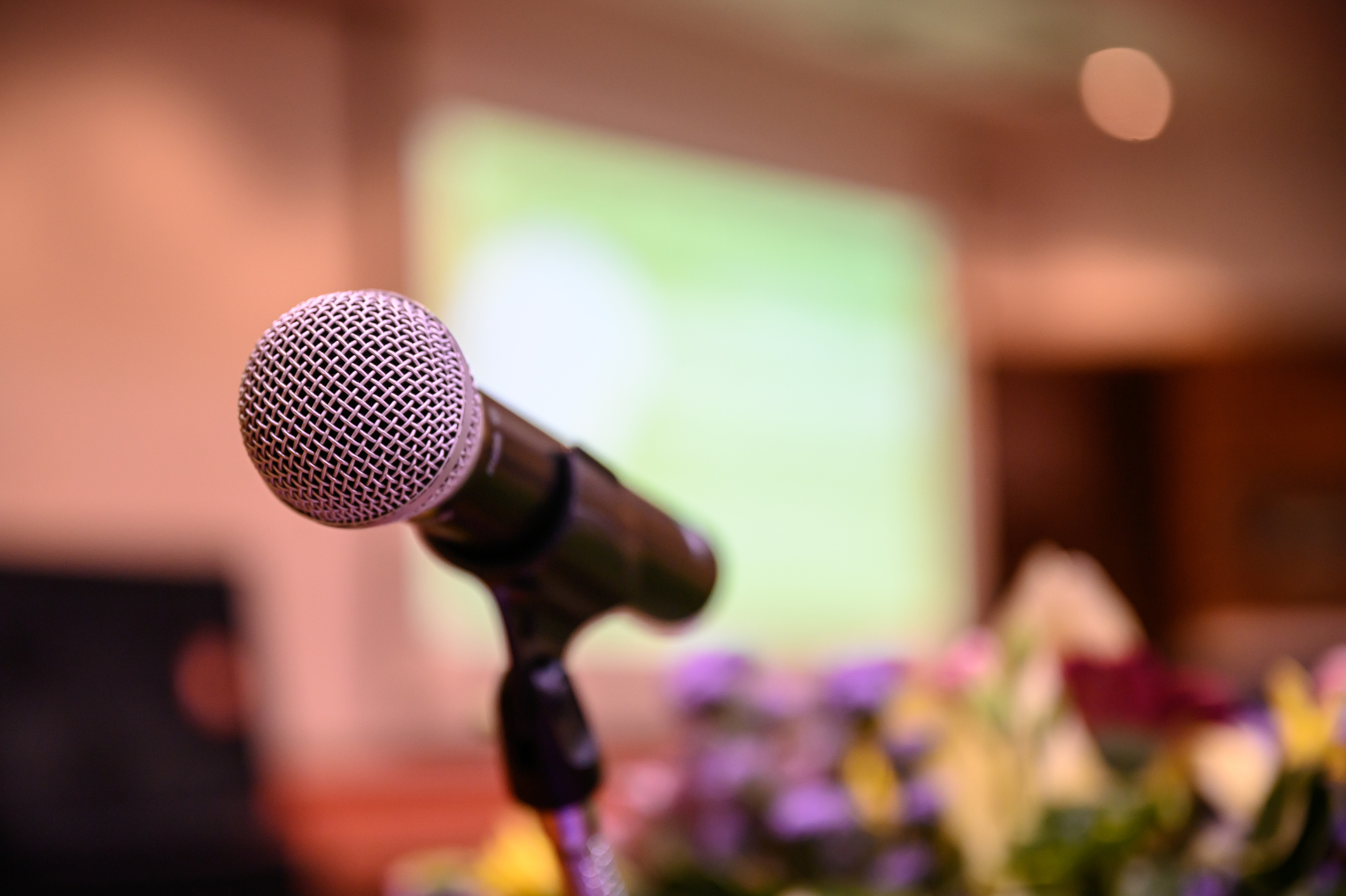 Microphone in foreground with blurred background